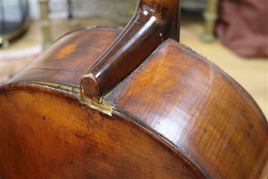 A full sized cello bearing label Arthur Richardson ... and two bows (one silver mounted), the other signed Wilhelm ... uhl